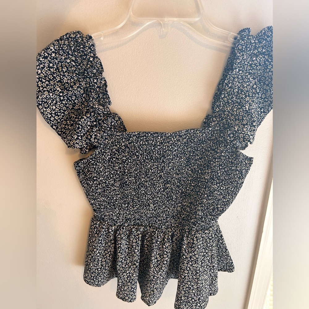 Black top from boutique never worn before with small flowers
